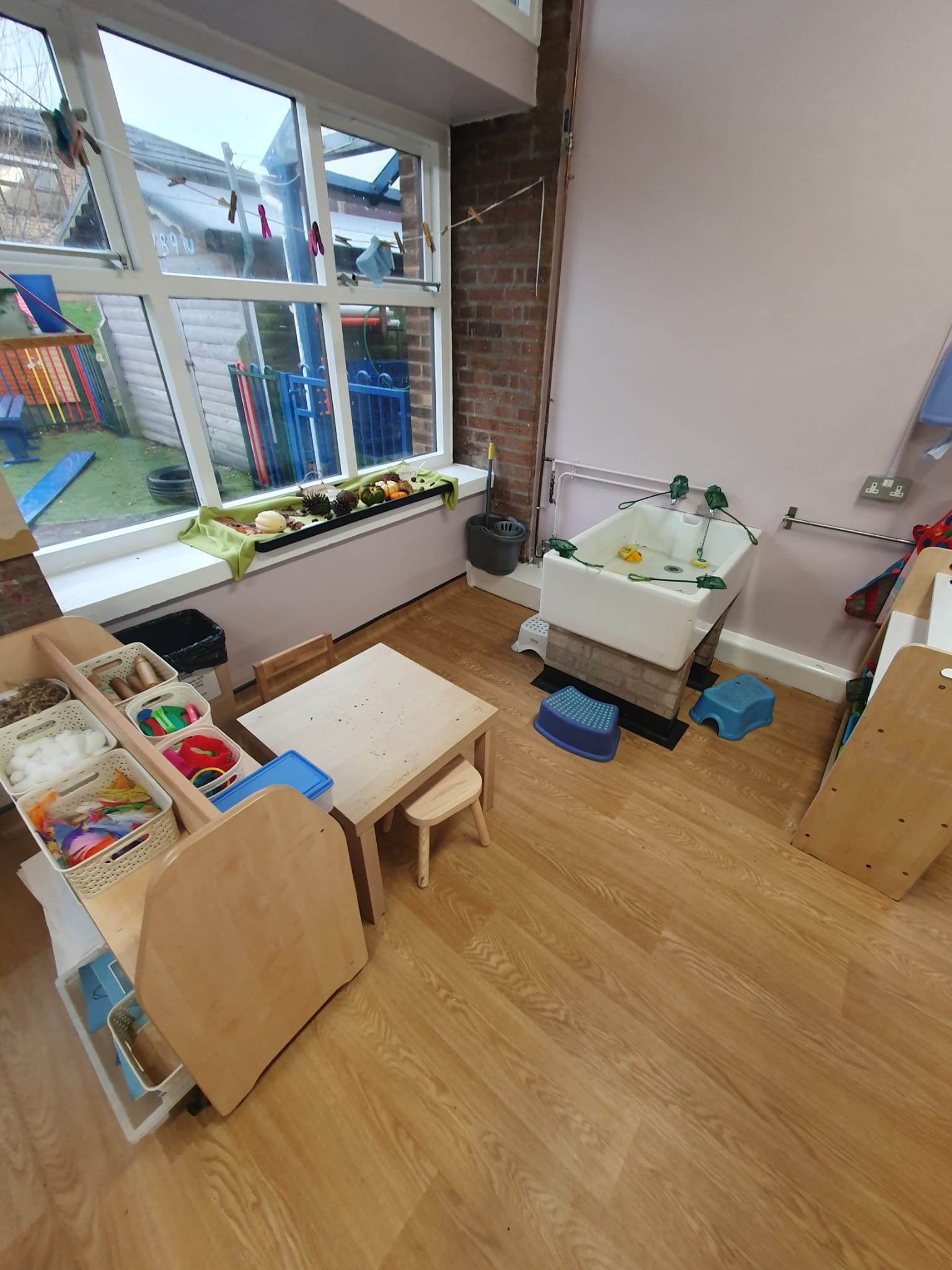 Pre-school setting, showing tables, sink and window looking out on to outdoor area, Moorside Pre-School - Nursery Education Lancaster